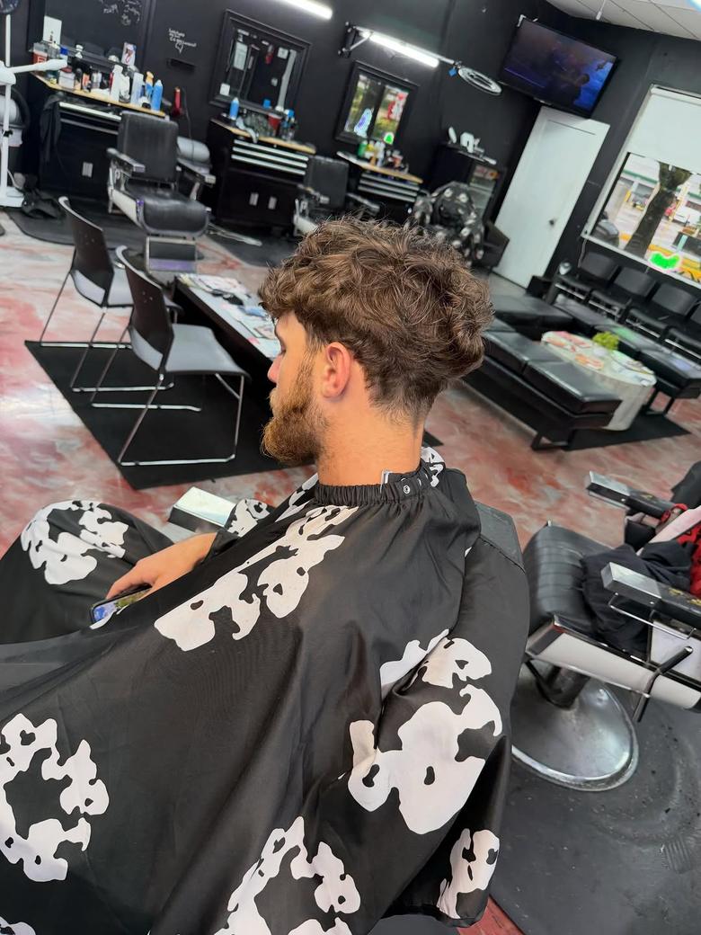 Same client before, with grown out curls and beard